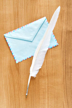 Writing feather and envelopeの写真素材