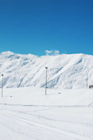 High mountains under snow in the winterの写真素材