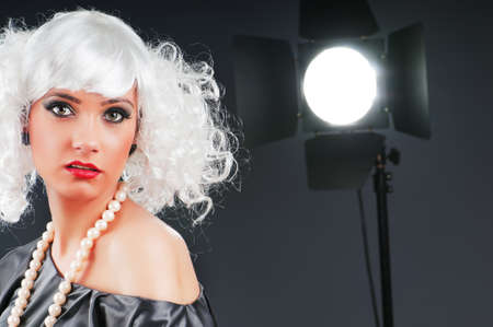 Young attractive girl with in the studio shooting
