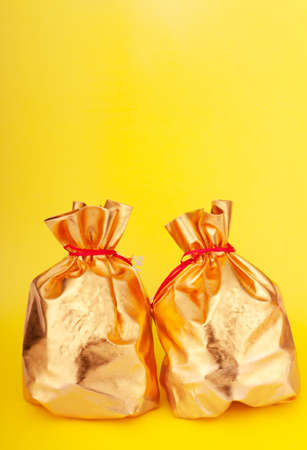 Golden sacks full of something goodの写真素材