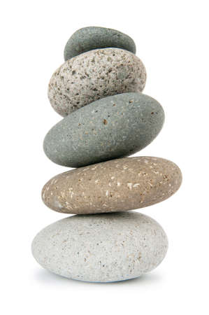 Stack of pebbles isolated on the white 