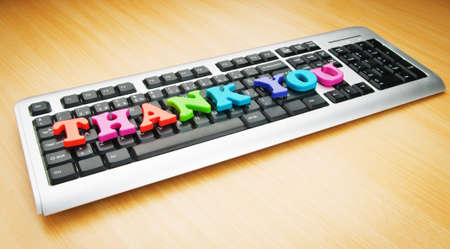 Thank you message on the keyboardの写真素材