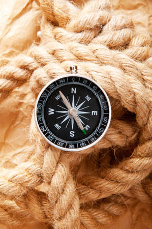 Compass and rope in travel and adventure conceptの写真素材