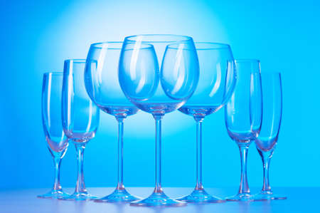 Wine glasses against gradient backgroundの写真素材