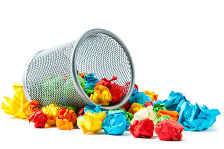 Garbage bin with paper waste isolated on white 