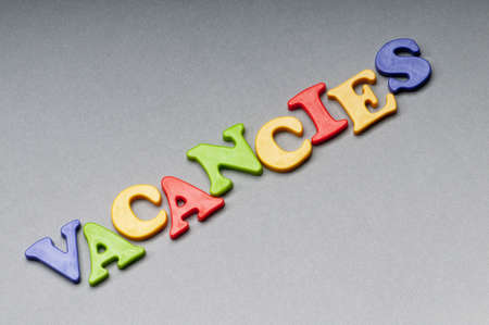 Employment concept with letters on backgroundの写真素材