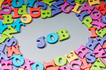 Employment concept with letters on backgroundの写真素材