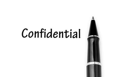 Pen and confidential message on whiteの写真素材