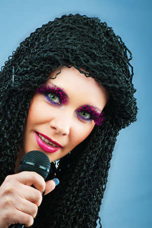 Pop star singing the song at concert