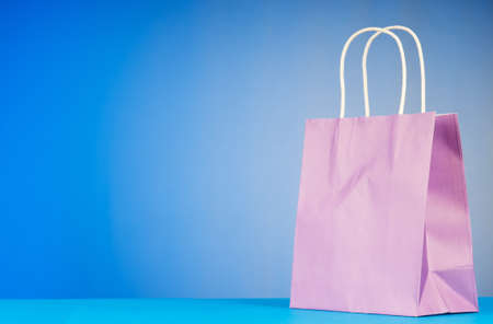 Shopping bags against gradient backgroundの写真素材