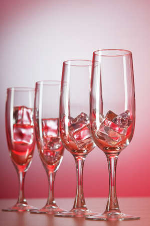 Water in the glass against gradient backgroundの写真素材