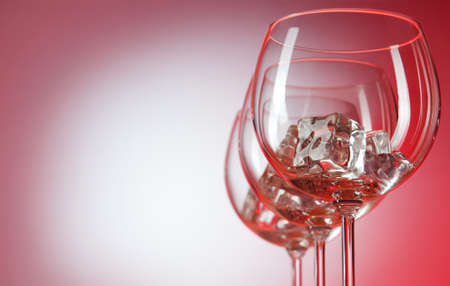 Water in the glass against gradient backgroundの写真素材