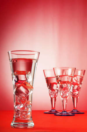 Water in the glass against gradient backgroundの写真素材