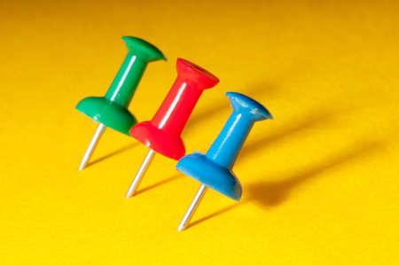 Office pins on the paperの写真素材