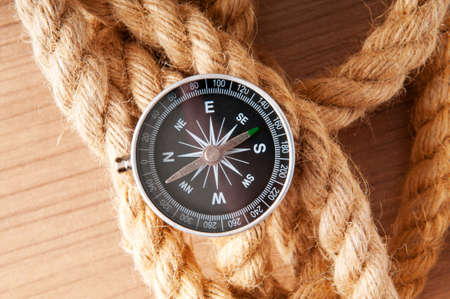 Compass and rope in travel and adventure conceptの写真素材