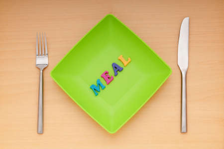 Plate with letters on the white background