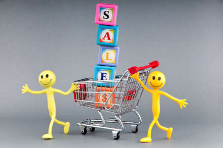 Happy family with shopping cart