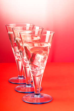 Water in the glass against gradient backgroundの写真素材