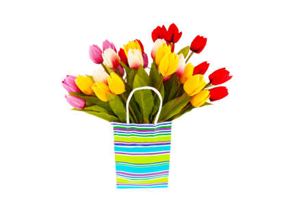 Tulips in the bag isolated on whiteの写真素材