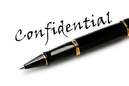 Pen and confidential message on whiteの写真素材