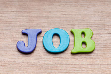 Employment concept with letters on backgroundの写真素材