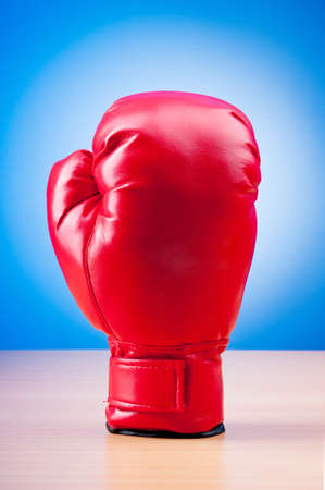 Red boxing gloves on the backgroundの写真素材