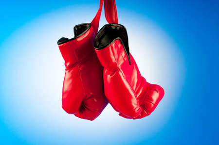 Red boxing gloves on the backgroundの写真素材