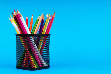 Colourful pencils on the background