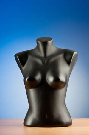 Clothing mannequins against gradient backgroundの写真素材
