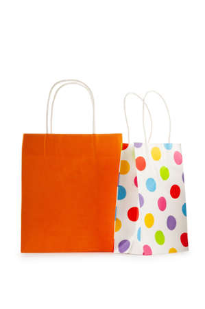 Colourful paper shopping bags isolated on white
