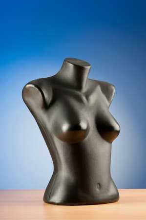 Clothing mannequins against gradient backgroundの写真素材