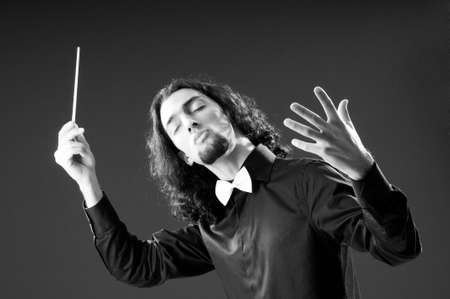 Music concept with passionate conductorの写真素材