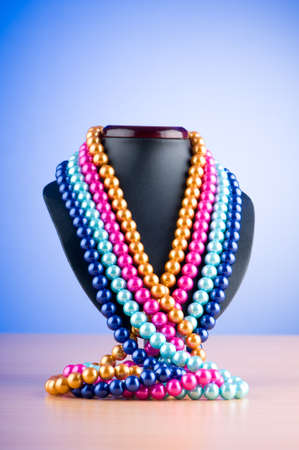 Pearl necklace against gradient backgroundの写真素材