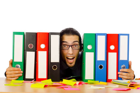 Businessman with many folders on whiteの写真素材