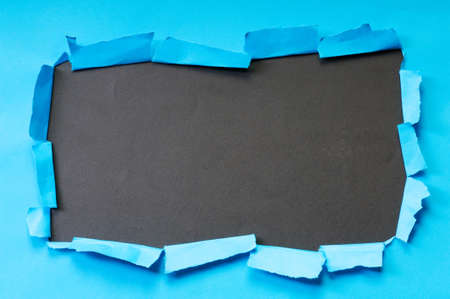 Space for your message on torn paperの写真素材