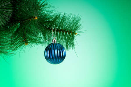 Christmas decoration against the colorful gradient backgroundの写真素材