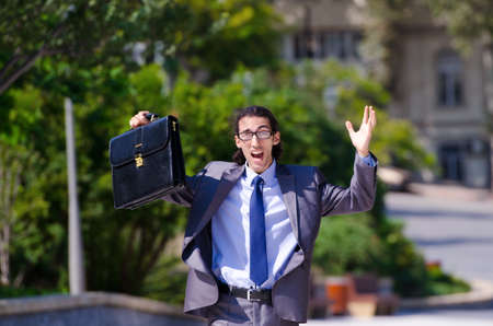 Young businessman at the street sceneの写真素材