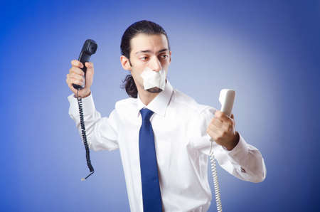 Businessman with his lips sealedの写真素材