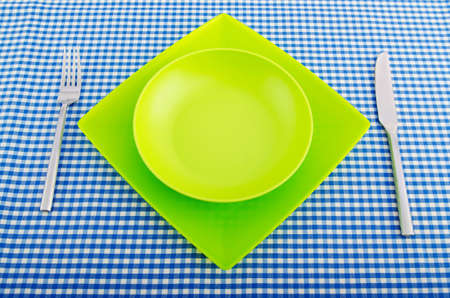 Empty plate with utensils