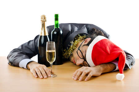 Drunken businessman after office christmas partyの写真素材