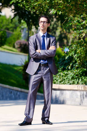 Young businessman at the street sceneの写真素材