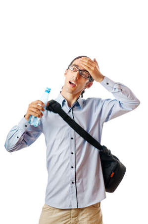 Student drinking water on whiteの写真素材