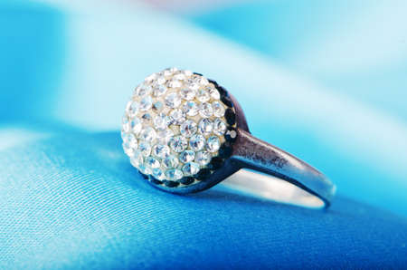 Jewellery ring on the satin backgroundの写真素材