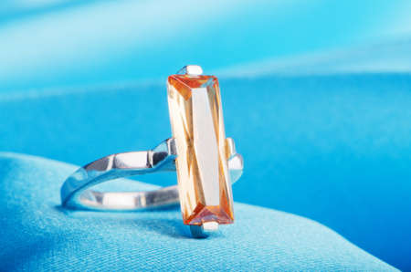 Jewellery ring on the satin backgroundの写真素材