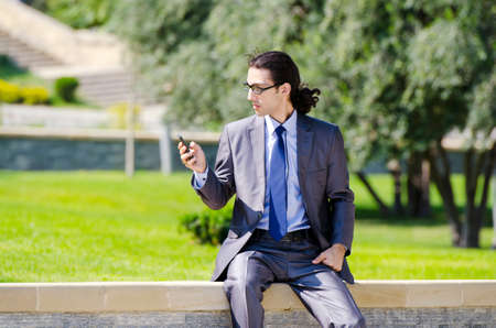Young businessman at the street sceneの写真素材