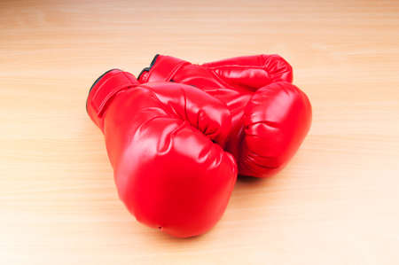 Boxing gloves on the tableの写真素材