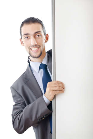 Young businessman with white boardの写真素材