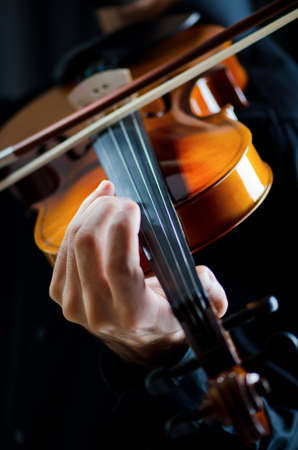 Violin player playing the intstrumentの写真素材