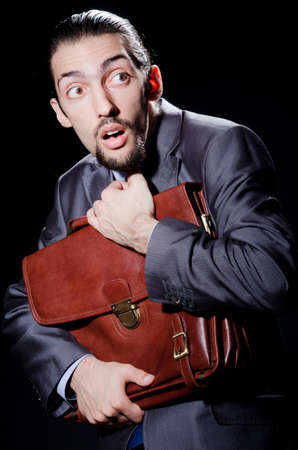 Business spy with briefcaseの写真素材