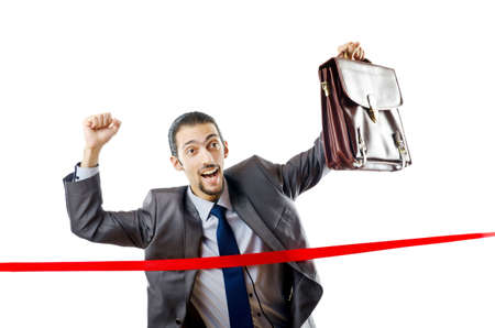 Businessman crossing finish lineの写真素材